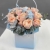 Стильная композиция в сумочке из роз Аваланж и эвкалипта в Ступино Стильная композиция в сумочке из роз Аваланж и эвкалипта в Ступино